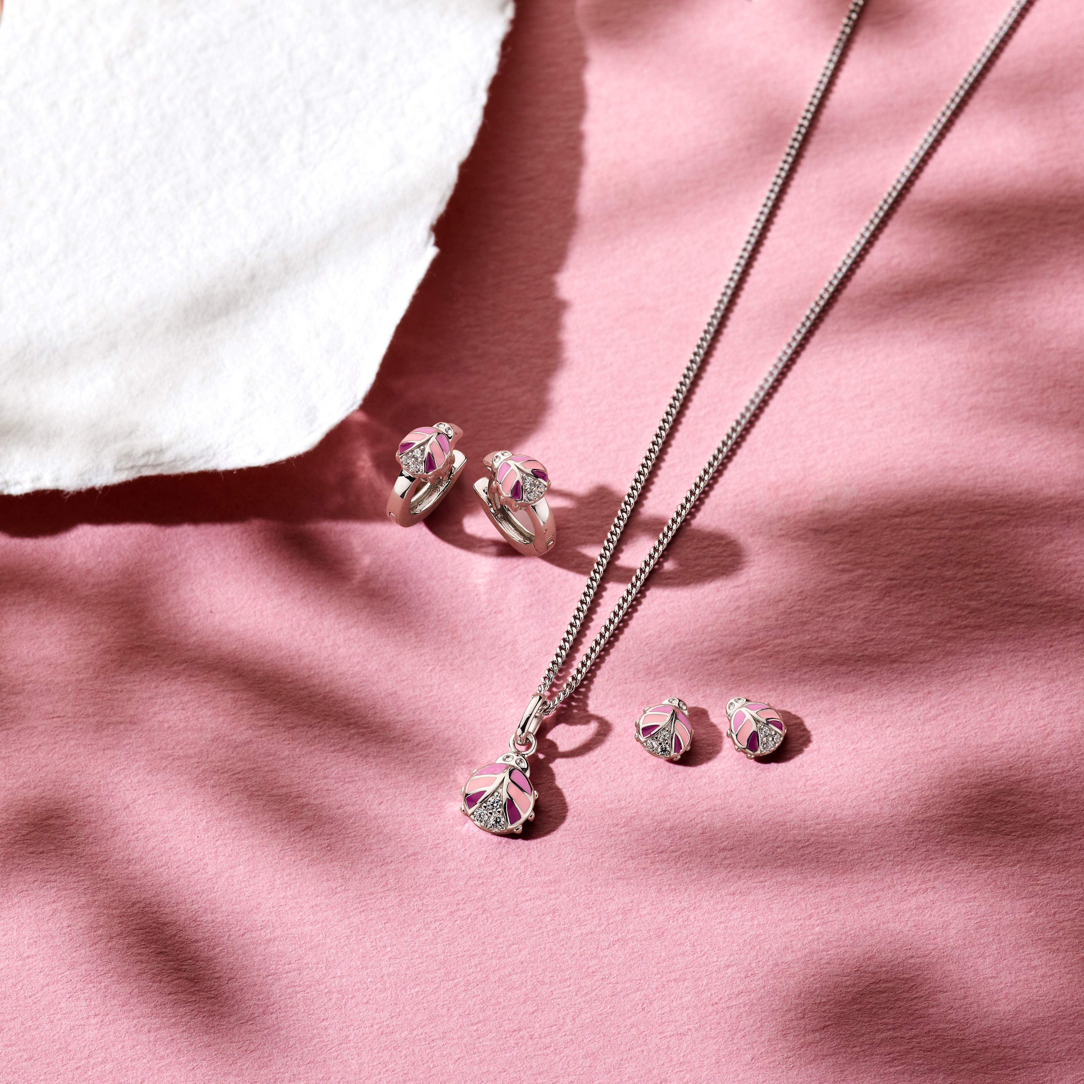 Silberne Kinderohrringe Creolen/Ohrstecker Marienkäfer rosa Zirkonia