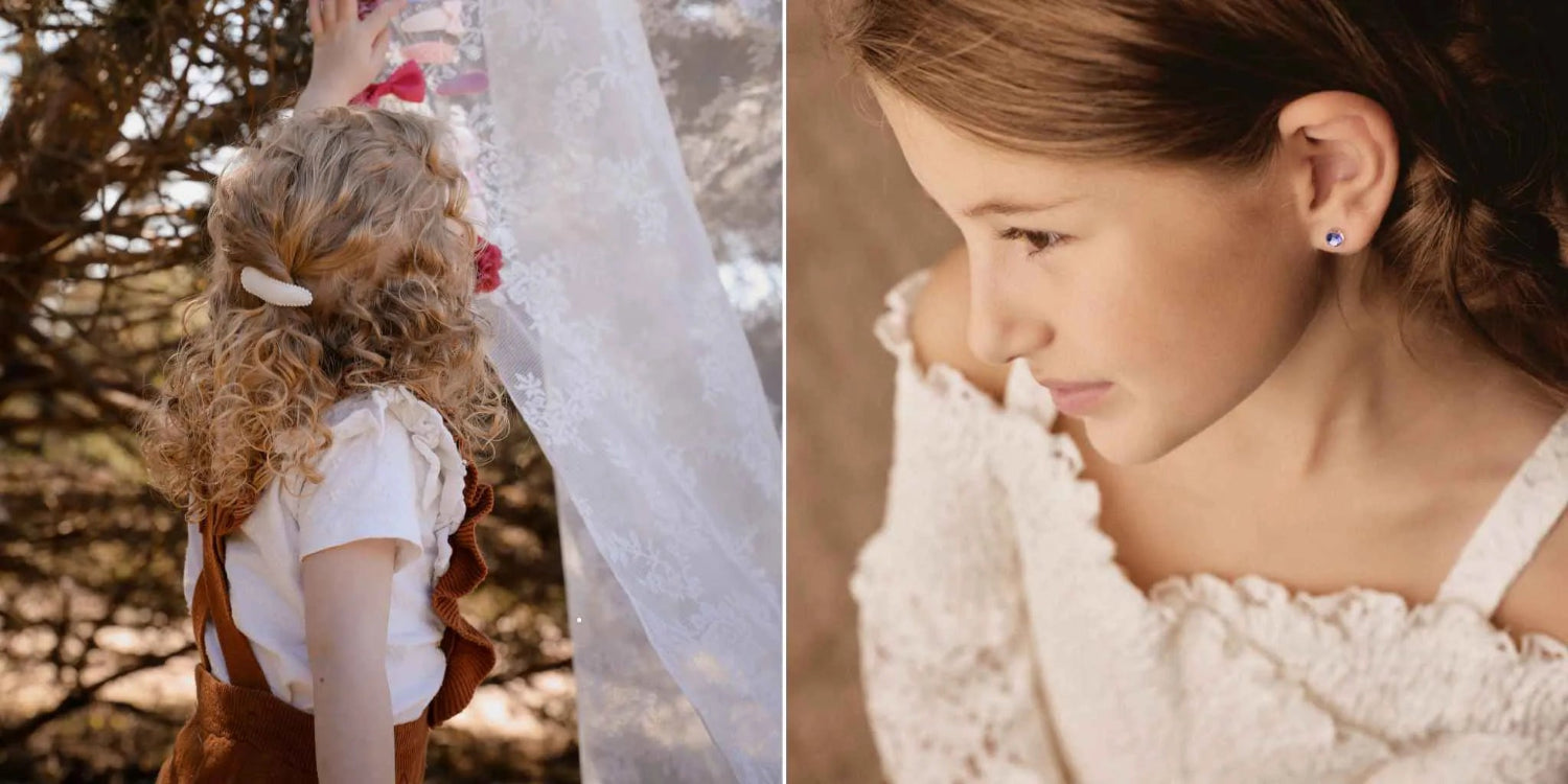 Meisje met haaraccessoires in het haar en een meisje met huidvriendelijke oorbellen van Blomdahl in.