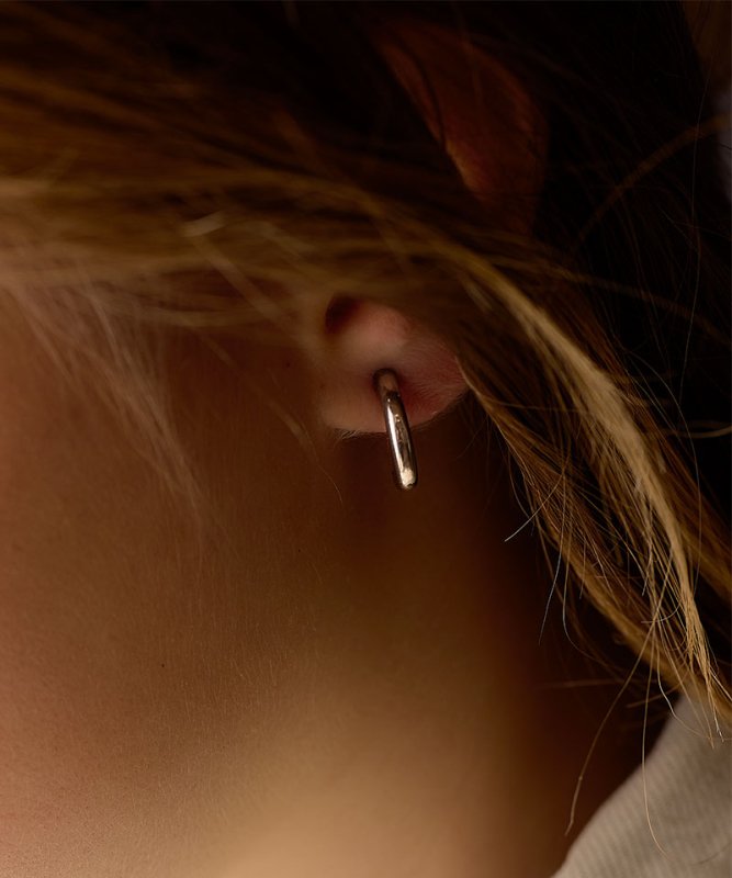 Oorbellen Blomdahl titanium boogje zilverkleurig 15 mm (incl. achterkantjes) - Staartjes en Strikjes