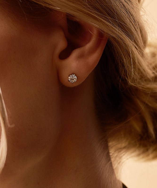 Oorbellen Blomdahl titanium goudkleurig knopje 6 mm. zirconiasteentje - Staartjes en Strikjes