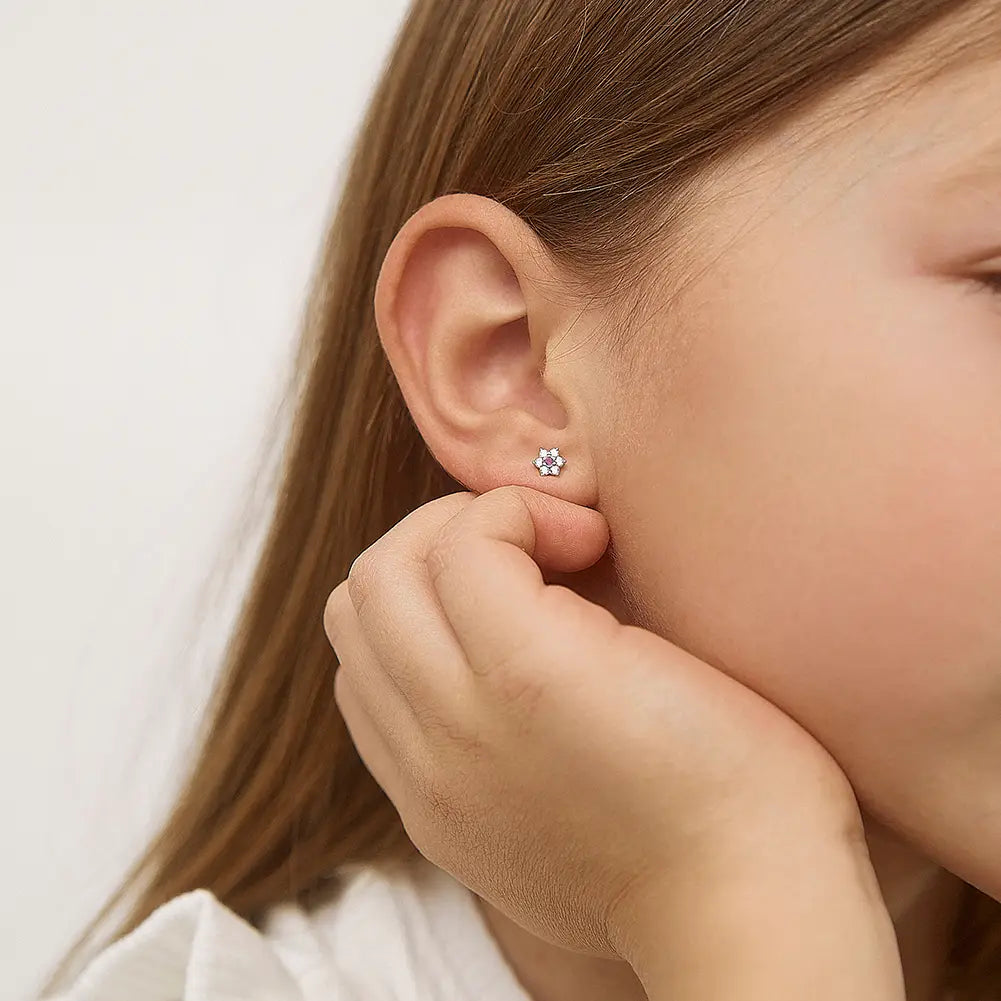 Zilveren kinderoorbellen bloemetjes zirconia met roze | schroefsluiting