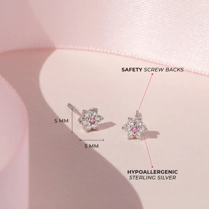 Zilveren kinderoorbellen bloemetjes zirconia met roze | schroefsluiting - Staartjes en Strikjes