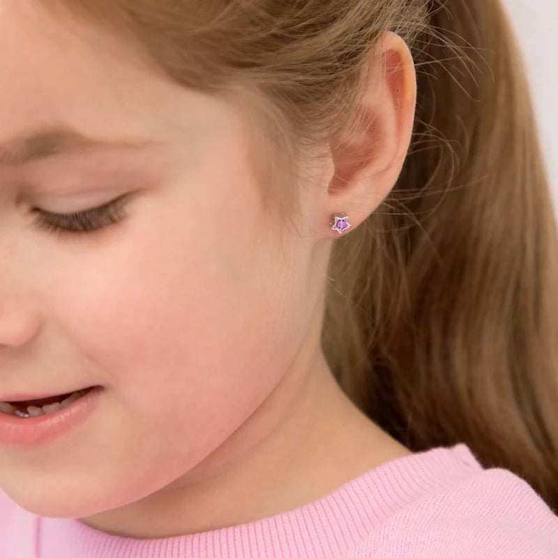 Zilveren kinderoorbellen sterretje roze zirconia | schroefsluiting - Staartjes en Strikjes
