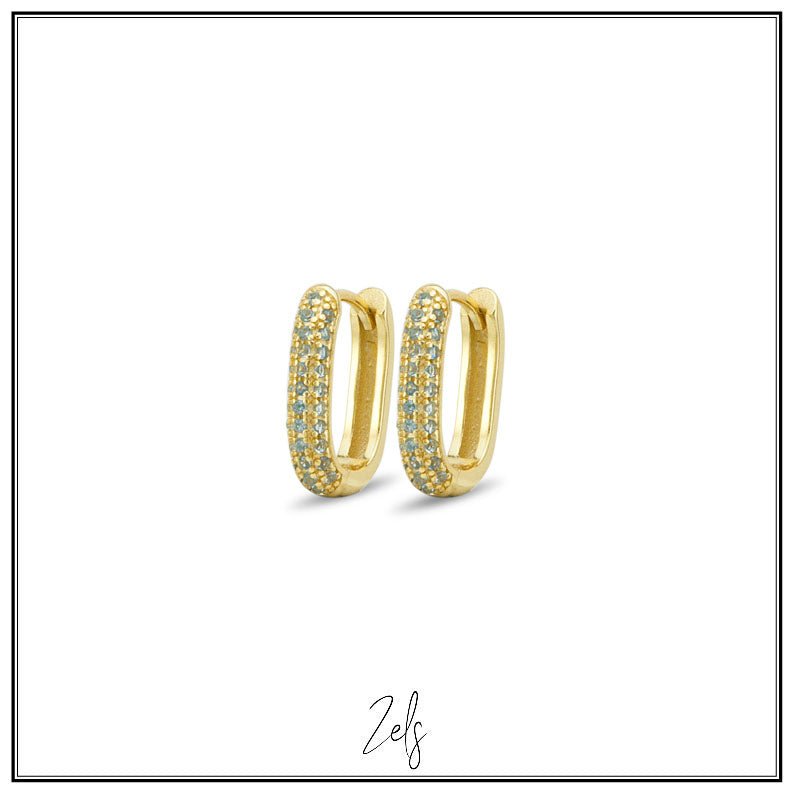 Zilveren oorbellen creolen/oorringetjes goudkleurig ovaal met zacht blauwe zirconia | Zels - Staartjes en Strikjes