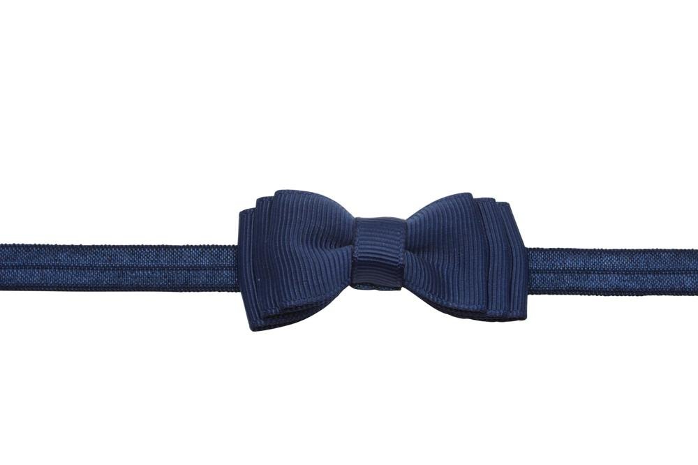 Babyhaarbandje strikje donker blauw - Staartjes en Strikjes