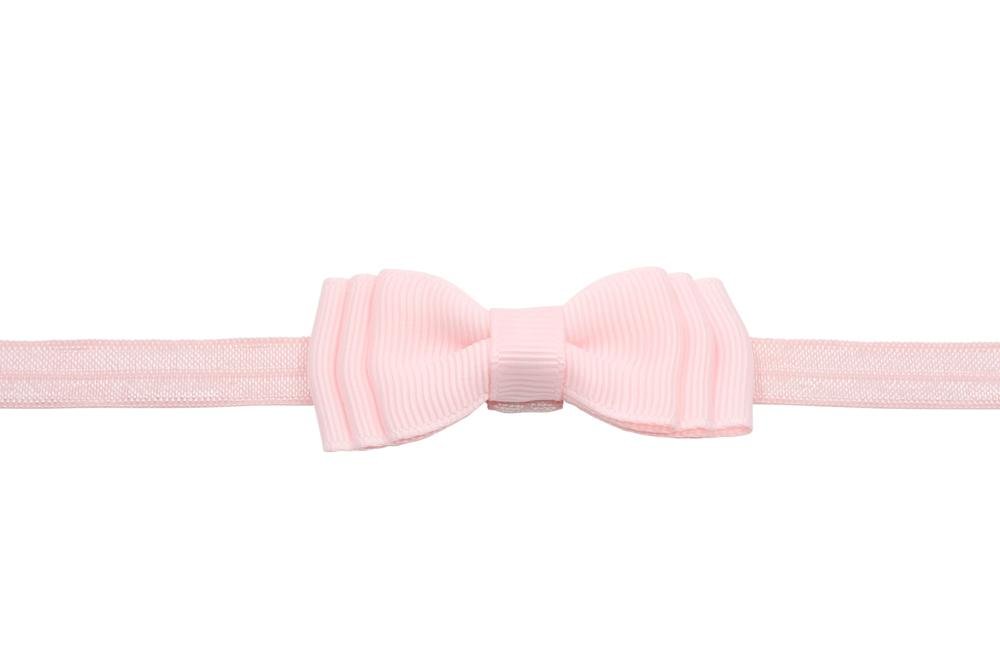 Babyhaarbandje strikje licht roze - Staartjes en Strikjes