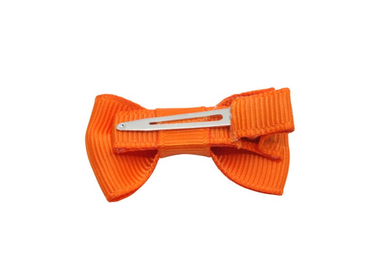 Baby/peuter haarstrikje klein oranje - Staartjes en Strikjes