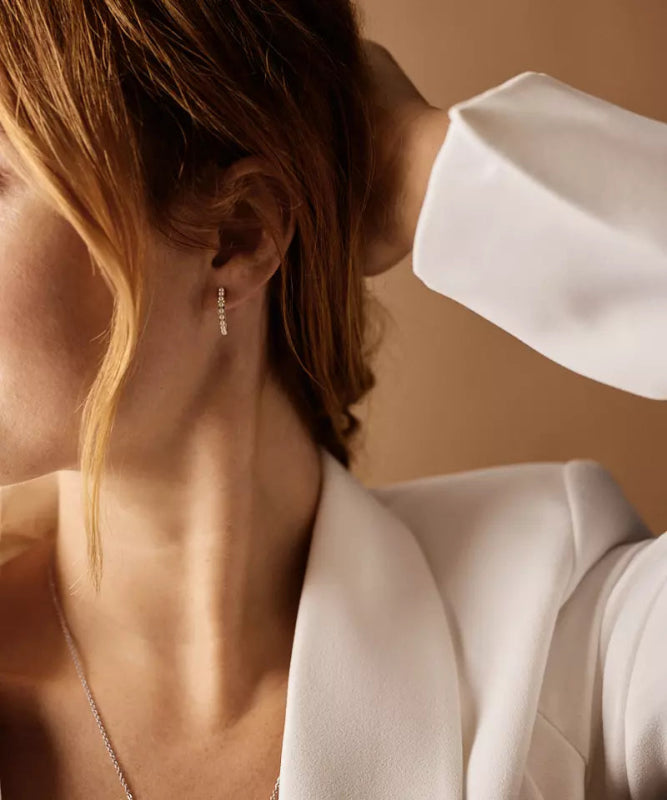 Oorbellen Blomdahl titanium boogje goudkleurig met crystal pearls 15 mm. (incl. achterkantjes) - Staartjes en Strikjes