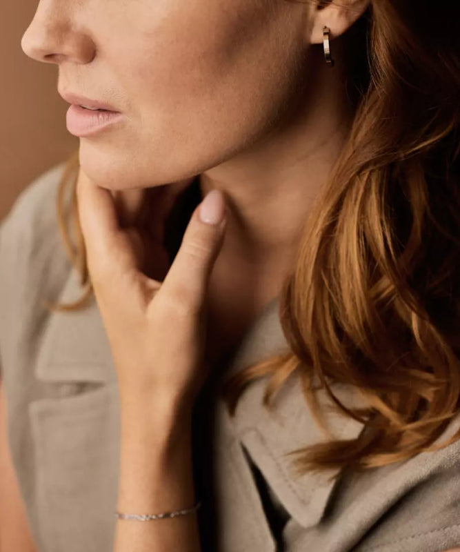 Oorbellen Blomdahl titanium boogje zilverkleurig 20 mm. (incl. achterkantjes) - Staartjes en Strikjes