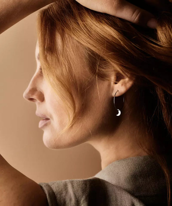 Oorbellen Blomdahl titanium oorringen 25 mm. met maan - Staartjes en Strikjes
