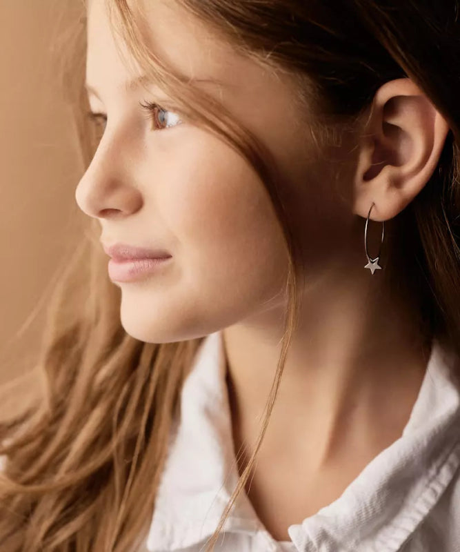 Oorbellen Blomdahl titanium oorringen 25 mm. met ster - Staartjes en Strikjes