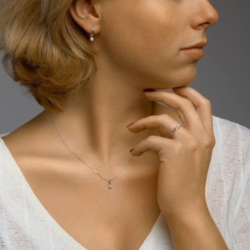 Zilveren kinderoorbellen zoetwater pareltjes oorringen - Staartjes en Strikjes