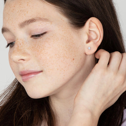 Zilveren kinderoorbellen goldplated knopje zirconia | schroefsluiting