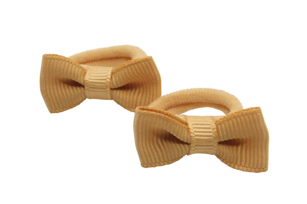 Kleine elastiekjes met mini strikjes oud goud bruin