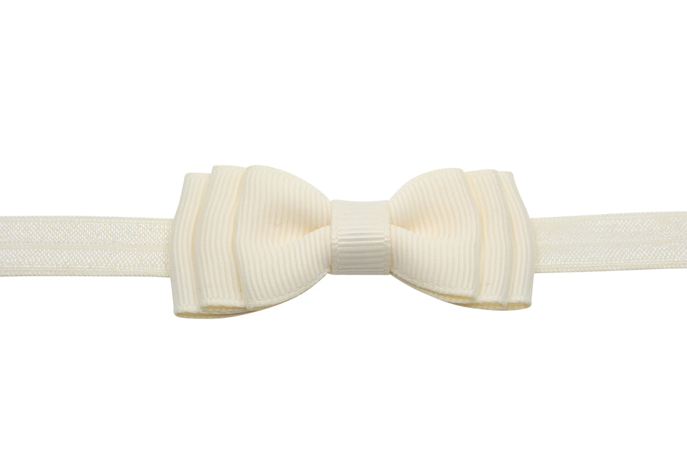 Babyhaarbandje strikje creme