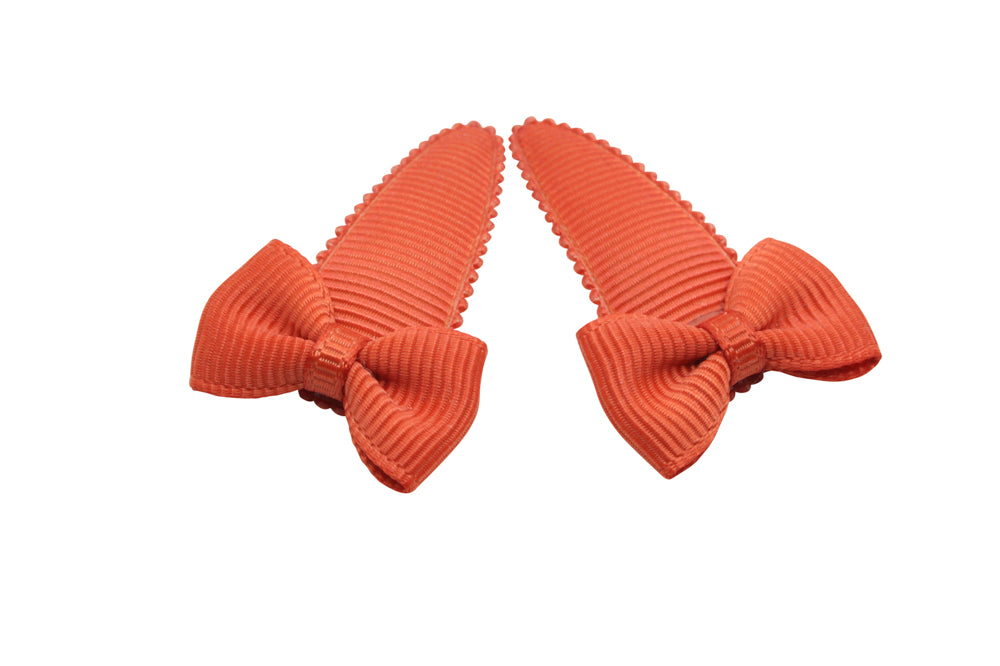 Baby haarspeldjes met strikjes - warm oranje/bruin