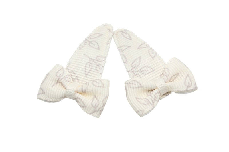 Baby haarspeldjes met strikjes - ivoor/creme met blaadjes - Staartjes en Strikjes