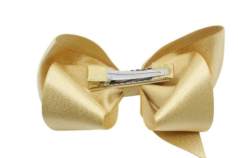 Grote haarstrik – goud met glittertje - Staartjes en Strikjes