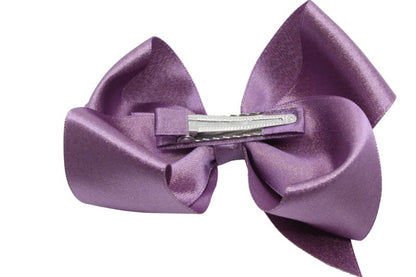 Grote haarstrik – paars glittertje - Staartjes en Strikjes