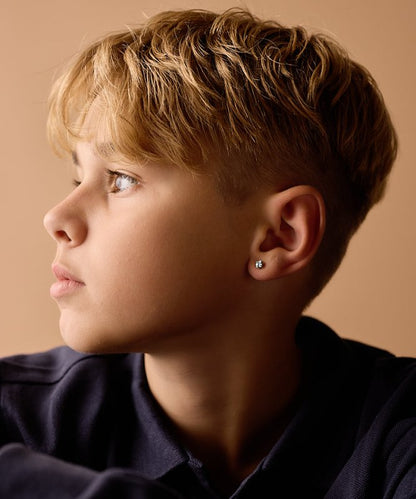 Oorbellen Blomdahl titanium goudkleurig knopje 5 mm. aqua zirconiasteentje - Staartjes en Strikjes