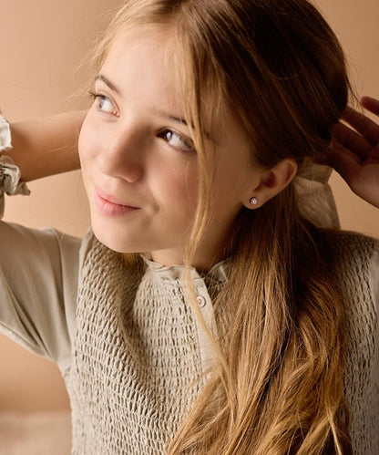Oorbellen Blomdahl titanium goudkleurig knopje 6 mm. zirconiasteentje - Staartjes en Strikjes