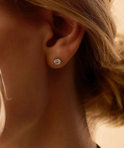 Oorbellen Blomdahl titanium goudkleurig knopje 6 mm. zirconiasteentje - Staartjes en Strikjes