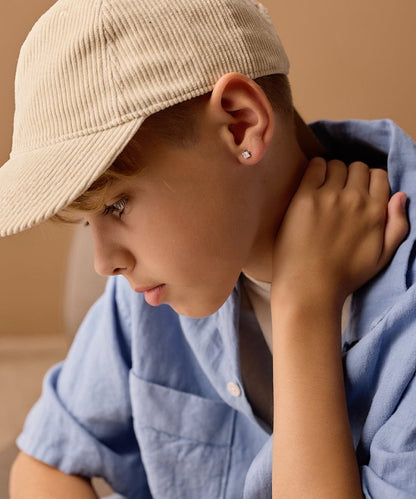 Oorbellen Blomdahl titanium knopje 5 mm. zirconiasteentje - Staartjes en Strikjes