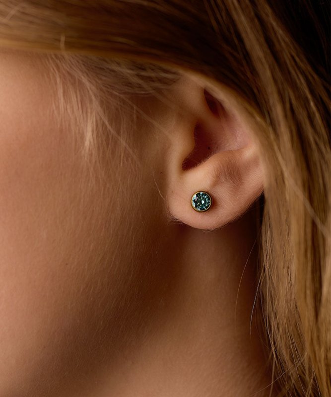 Oorbellen Blomdahl titanium knopje 6 mm. crystal turqoise (incl. achterkantjes) - Staartjes en Strikjes