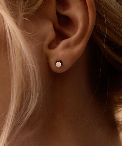 Oorbellen Blomdahl titanium knopje 6 mm. zirconiasteentje - Staartjes en Strikjes