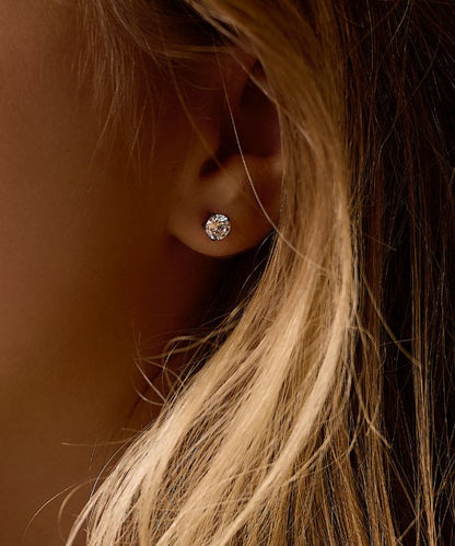 Oorbellen Blomdahl titanium knopje 6 mm. zirconiasteentje - Staartjes en Strikjes