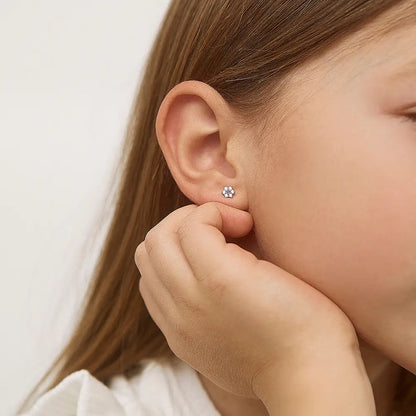 Zilveren kinderoorbellen bloemetjes zirconia met roze | schroefsluiting