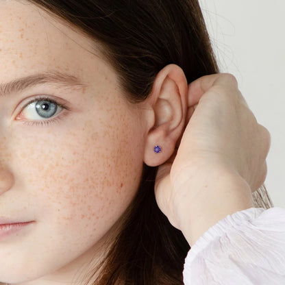 Zilveren kinderoorbellen goldplated knopje paars zirconia | schroefsluiting