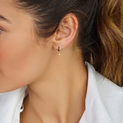 Zilveren kinderoorbellen creolen/oorringen pareltje - Staartjes en Strikjes