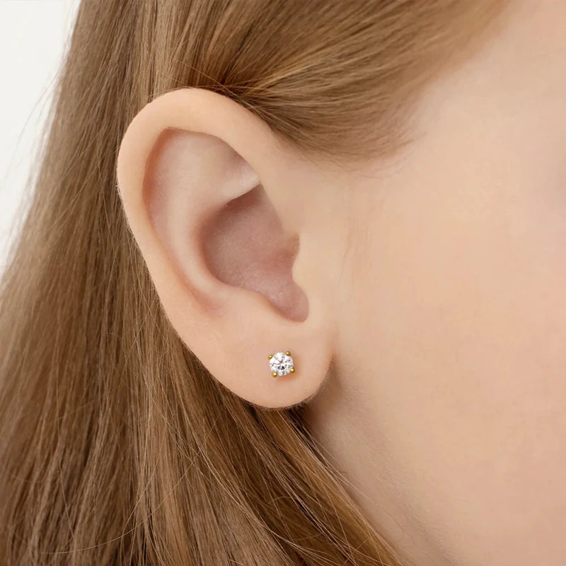 Zilveren kinderoorbellen goldplated knopje zirconia 4 mm | schroefsluiting - Staartjes en Strikjes