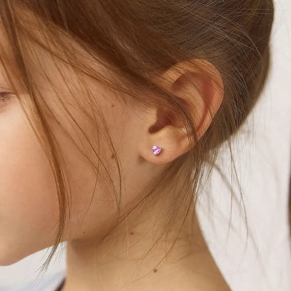 Zilveren kinderoorbellen hartjes lichtroze | schroefsluiting - Staartjes en Strikjes