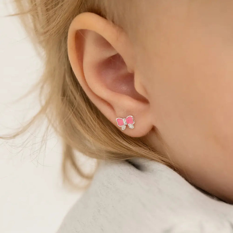 Zilveren kinderoorbellen roze strikje met zirconia | schroefsluiting - Staartjes en Strikjes