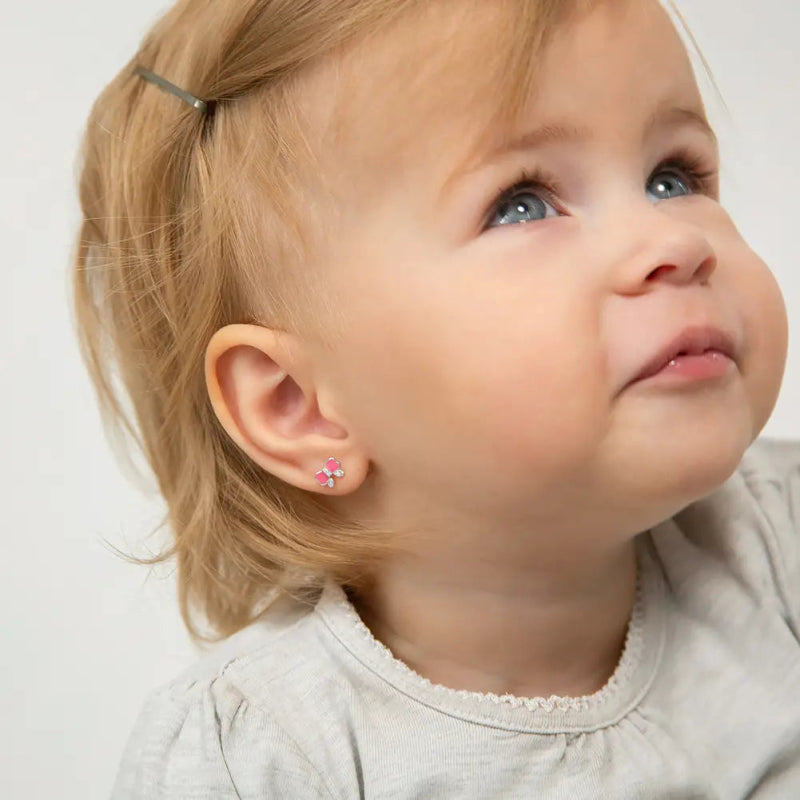 Zilveren kinderoorbellen roze strikje met zirconia | schroefsluiting - Staartjes en Strikjes