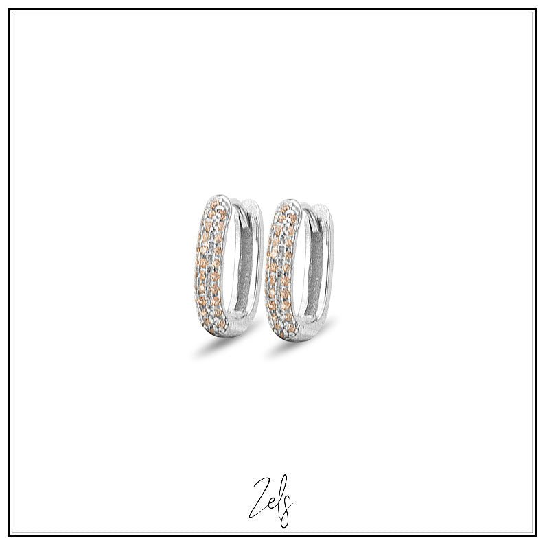 Zilveren oorbellen creolen/oorringetjes ovaal met warm gele zirconia | Zels - Staartjes en Strikjes