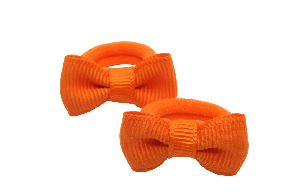 Kleine elastiekjes met mini strikjes oranje - Staartjes en Strikjes