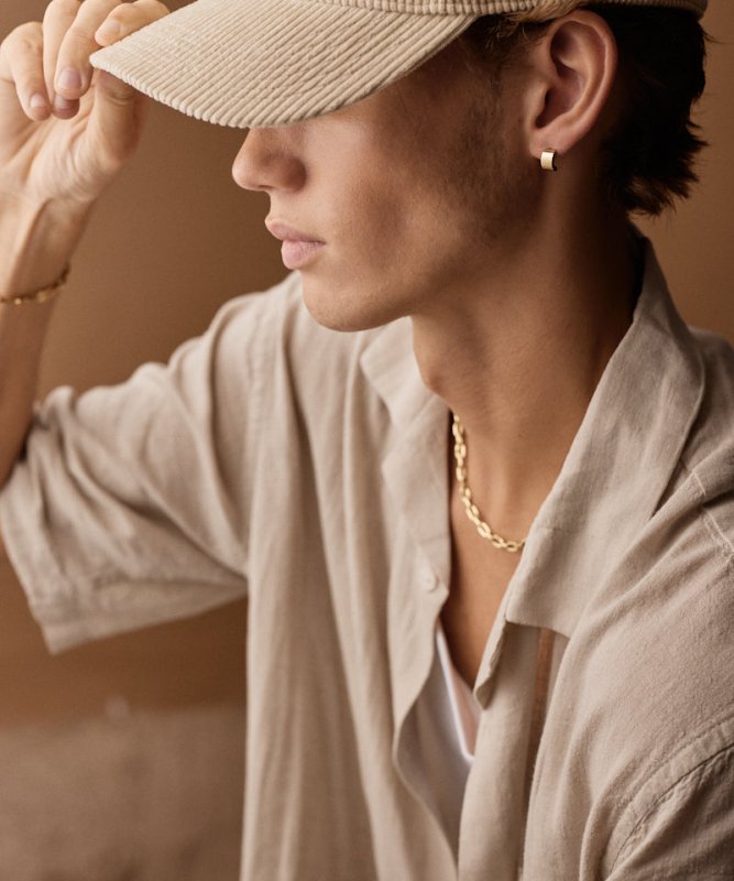 Oorbellen Blomdahl titanium boog goudkleurig 10 mm. (incl. achterkantjes) - Staartjes en Strikjes