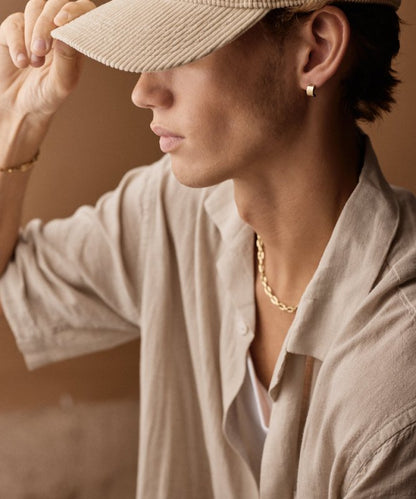 Oorbellen Blomdahl titanium boog goudkleurig 10 mm. (incl. achterkantjes) - Staartjes en Strikjes