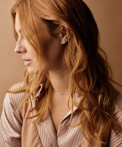 Oorbellen Blomdahl titanium edge 7 mm. (incl. achterkantjes) - Staartjes en Strikjes