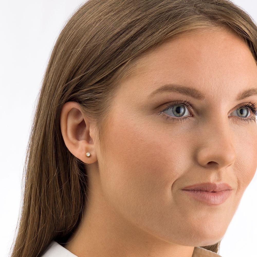 Oorbellen Blomdahl titanium knopje Swarovski crystal 4 mm. goudkleurig - Staartjes en Strikjes