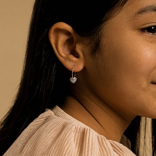 Oorbellen Blomdahl titanium oorringen 14 mm. met hartje - Staartjes en Strikjes